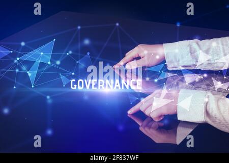 Businessman touching huge screen concept Stock Photo