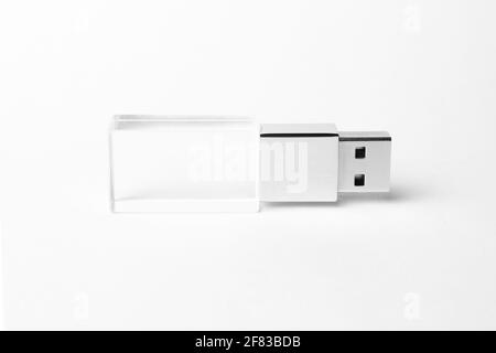 Glass USB flash drive isolated on grey background. Layout. Copy space. A high resolution. Stock Photo
