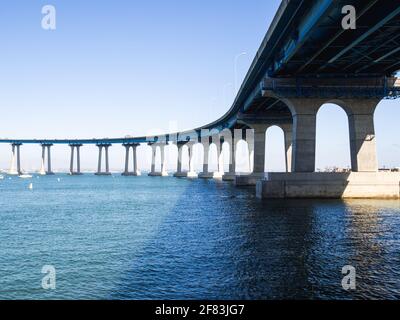 very long bridge in summer on a clear sunny day Stock Photo
