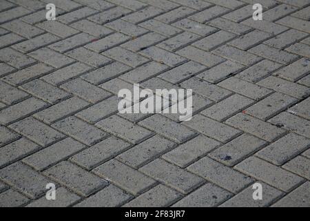 salvador, bahia, brazil - january 22, 2021: street pavement made of concrete brick in the Barra district in the city of Salvador. Stock Photo