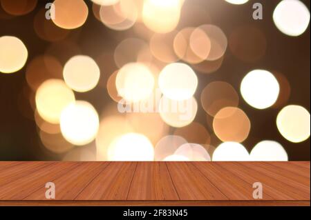 Festive background with light bokeh in front of a empty wooden tables Stock Photo