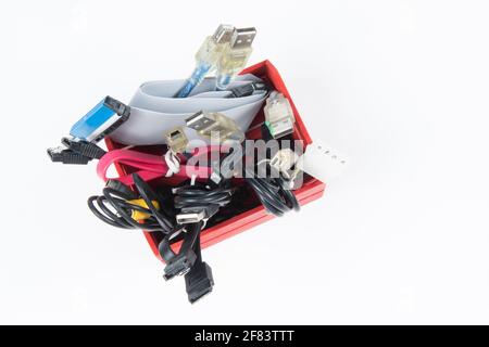 technological waste that remains in residence as computer cables Stock Photo