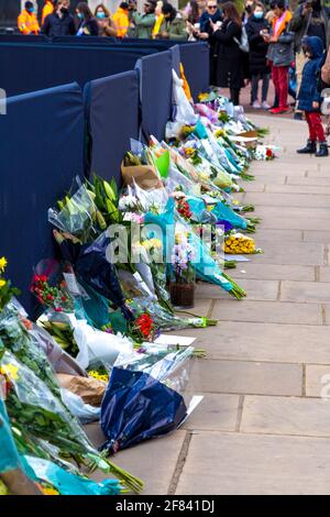 11 April 2021, London, UK - Flowers laid as tribute to Prince Philip, Duke of Edinburgh outside Buckingham Palace after his death on the 9th April Stock Photo
