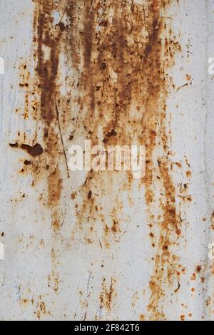 Old rusty aged white grunge metal surface texture background Stock Photo