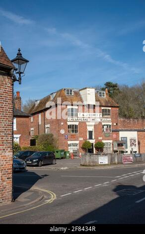 Wickham, Hampshire, England, UK. 2021. Bridge Street and the former flour mill, Chesapeake Mill in the historic village of Wickham, Hampshire, UK Stock Photo