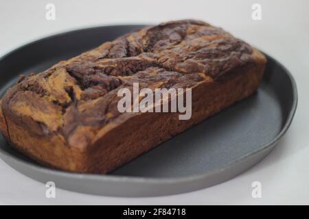Home baked chocolate banana bread loaf, fresh from oven Stock Photo
