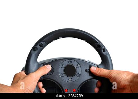 Hands holding gaming steering wheel on white background. Stock Photo