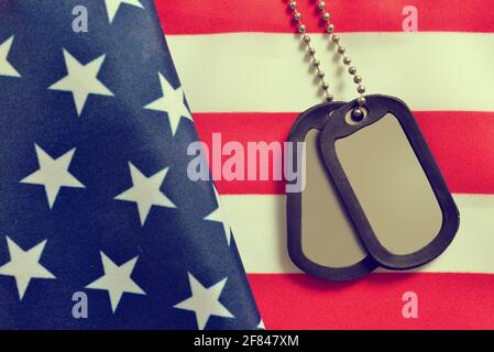 Close up of american flag and soldiers badges.Veterans Day Concept. Stock Photo