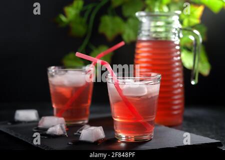 Refreshing chilled summer fruit drink. Homemade compote. Stock Photo