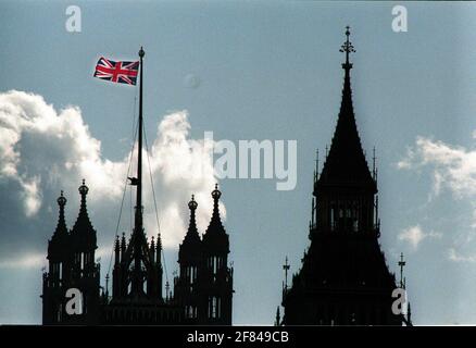 Union Jack flag flying from the Houses of Parliament