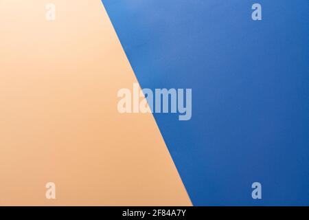 Blue and orange color paper background, texture, copy space, diagonal. Stock Photo