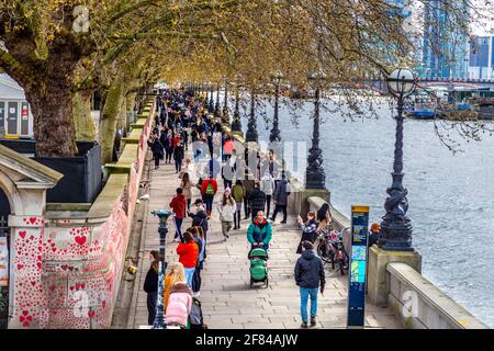 11 April 2021, London, UK - The National COVID Memorial Wall along the South Bank filled with hearts to commemorate those who died during the coronavirus pandemic Stock Photo