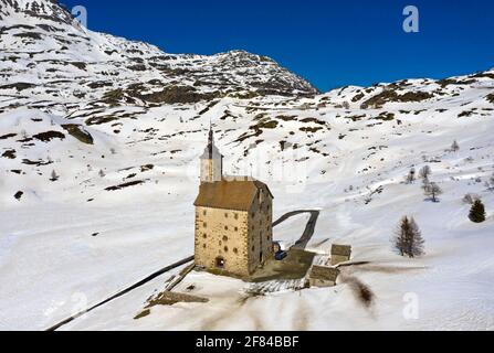 Medieval hospice Alter Spittel in winter, Simplon Pass near Brig, Valais, Switzerland Stock Photo