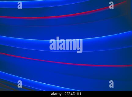 A bright blue and red led wavy lights background Stock Photo