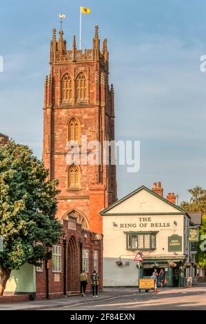 The Ring of Bells public house next to the tower of St James church in Taunton.