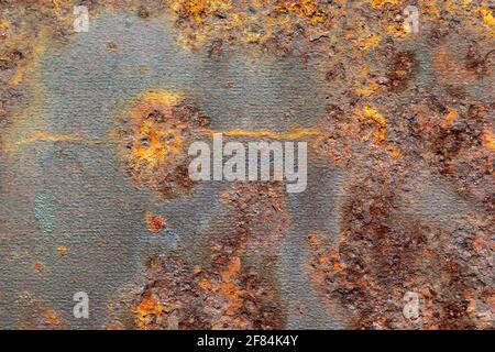 Metal covered with rust. Rusty sheet metal. Background of rusty metal. Stock Photo