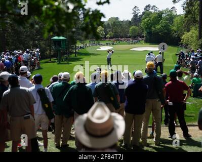 Augusta, United States. 11th Apr, 2021. Xander Schauffele hits his tee shot on the 4th hole in the final round of the 2021 Masters Tournament at the Augusta National Golf Club in Augusta, Georgia on Sunday, April 11, 2021. Photo by Kevin Dietsch/UPI Credit: UPI/Alamy Live News