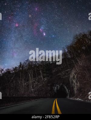 The Winter night sky over the Mary's Rock Tunnel in Shenandoah National Park. Stock Photo