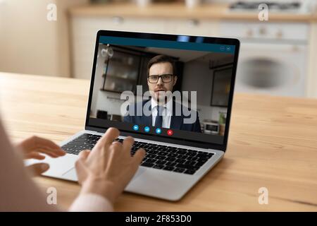 Confident young businessman consult support female client by video call Stock Photo