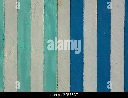 Vertical stripes painted in shades of blue. Stock Photo