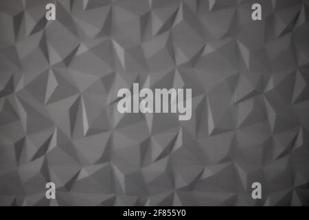 Abstract background of polygons on grey background Stock Photo