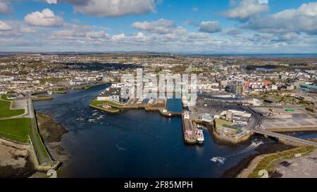 Aerial view of Galway city from Bay, with river Corrib, Claddagh and ...
