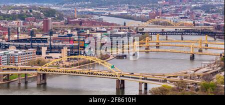 Bridges that connect downtown Pittsburgh with the north side crossing over the Allegheny river and PNC Park, Pittsburgh, Pennsylvania, USA Stock Photo