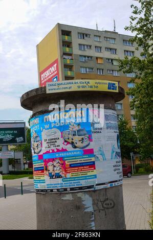 POZNAN, POLAND - Oct 18, 2015: Advertisement cylinder in front of a apartment building Stock Photo