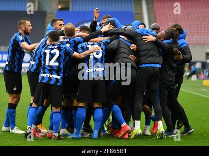 Milan, Italy. 11th Apr, 2021. FC Inter's players celebrate Matteo Darmian's goal during a Serie A football match between FC Inter and Cagliari in Milan, Italy, April 11, 2021. Credit: Str/Xinhua/Alamy Live News Stock Photo