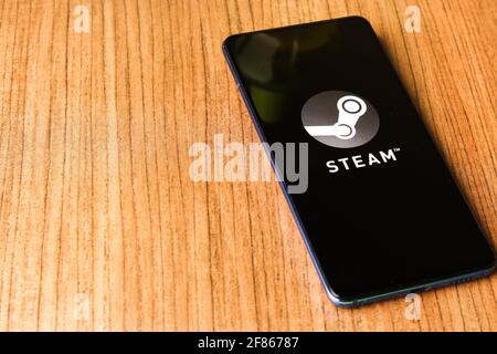 Assam, india - April 10, 2021 : Steam logo on phone screen stock image. Stock Photo