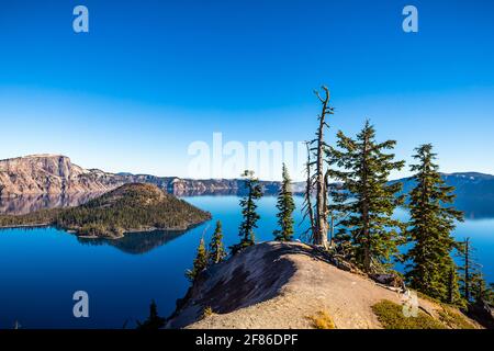 Wizard Island overlook from the Rim Trail in Crater Lake National Park, Oregon on a sunny day Stock Photo