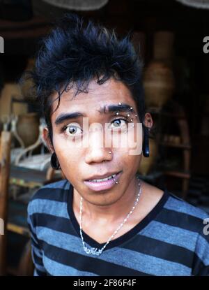 A pierced Balinese young man in Ubud, Bali, Indonesia. Stock Photo