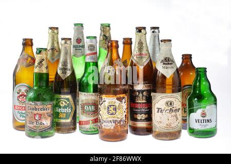 Old degraded glass beer bottles Stock Photo