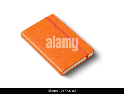 Orange closed notebook mockup isolated on white Stock Photo