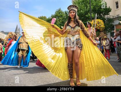 Participant and dancer from Paraiso School of Samba in colourful costume at Notting Hill carnival street festival and parade, London, UK Stock Photo