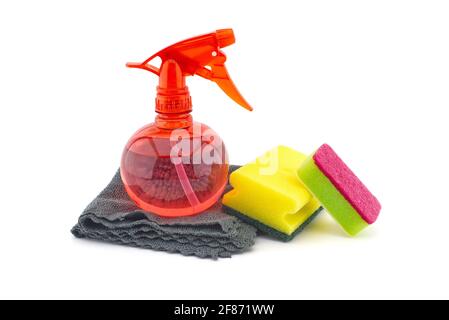 Microfiber cloths, spray bottle and colorful cleaning sponges isolated on a white background. House cleaning products Stock Photo
