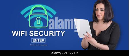 Woman using digital tablet with wifi security concept on background Stock Photo