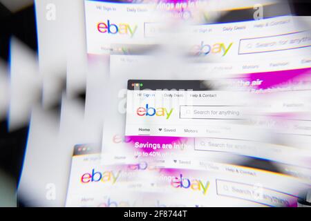 Milan, Italy - APRIL 10, 2021: eBay logo on laptop screen seen through an optical prism. Illustrative editorial image from eBay website. Stock Photo