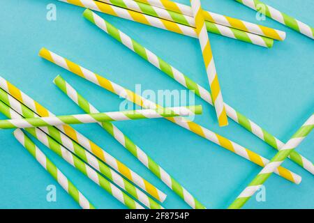 Red and white party drinking straws on white background with copy space Stock Photo