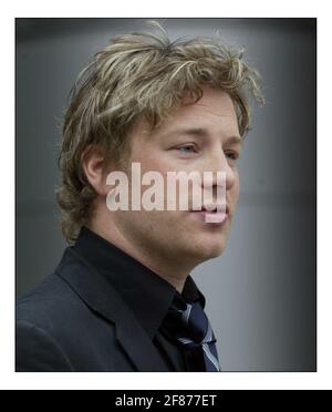 Jamie Oliver at a photocall before his press conf re school dinners held at Channel Four in Londonpic David Sandison 30/3/2005 Stock Photo