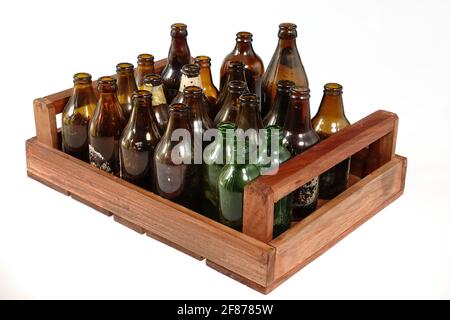 Old degraded glass beer bottles Stock Photo