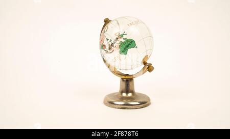 The glass globe on a white background. Stock Photo