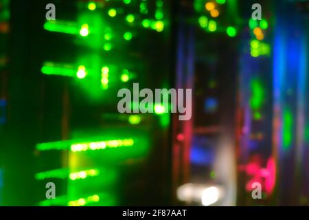 Blurred background of server hardware for artificial intelligence, bokeh of lamps of computers ai and network routers Stock Photo