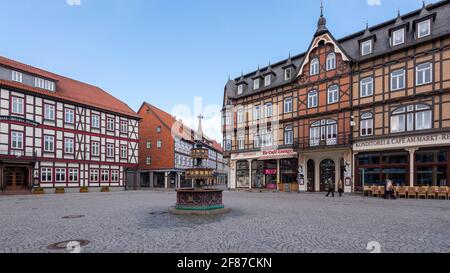 Wernigerode, Germany. 05th Apr, 2021. The richly decorated neo-Gothic benefactor fountain stands on Wernigerode's market square, with historic half-timbered houses behind it. Credit: Stephan Schulz/dpa-Zentralbild/ZB/dpa/Ģ����ý Live News Stock Photo