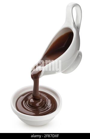 Pouring melted chocolate isolated on white background Stock Photo