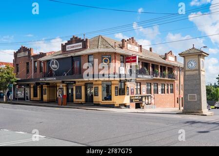 The 1930's built Art Deco design Commercial Hotel and the Dr Evershed clock on the main street in Bega on the New South Wales south coast in Australia Stock Photo