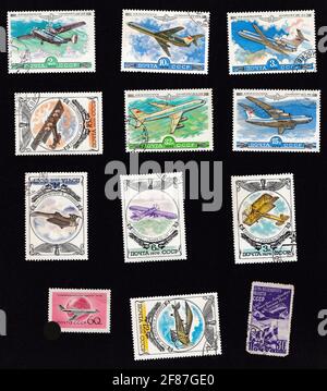 USSR - circa 1970: A set of postage stamps depicting airplanes. Aircraft An-28, TU-154, Yak-42, IL-86, IL-76, TU-110, Ilya Muromets, Dybrovsky, Gakkel, Steglau. Drawing on an old stamp. Plane collage. Stock Photo