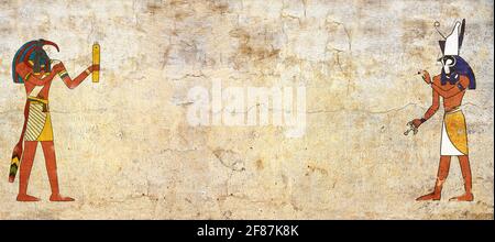 Grunge background with Egyptian gods images Toth and Horus and old stucco texture of beige color. Horizontal banner in egyptian style. Mock up templat Stock Photo