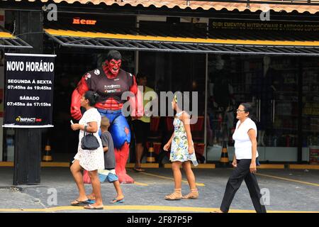 salvador, bahia / brazil - march 15, 2018: Incredible red huck doll is seen on Dorival Caymmi Avenue in Itapua in the city of Salvador. *** Local Capt Stock Photo