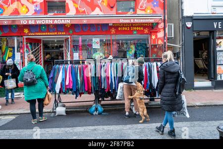 Brighton UK 12th April 2021 -  The North Laine area of Brighton is packed with shoppers as the next stage of lockdown easing begins in England with non essential shops being allowed to reopen : Credit Simon Dack / Alamy Live News Stock Photo